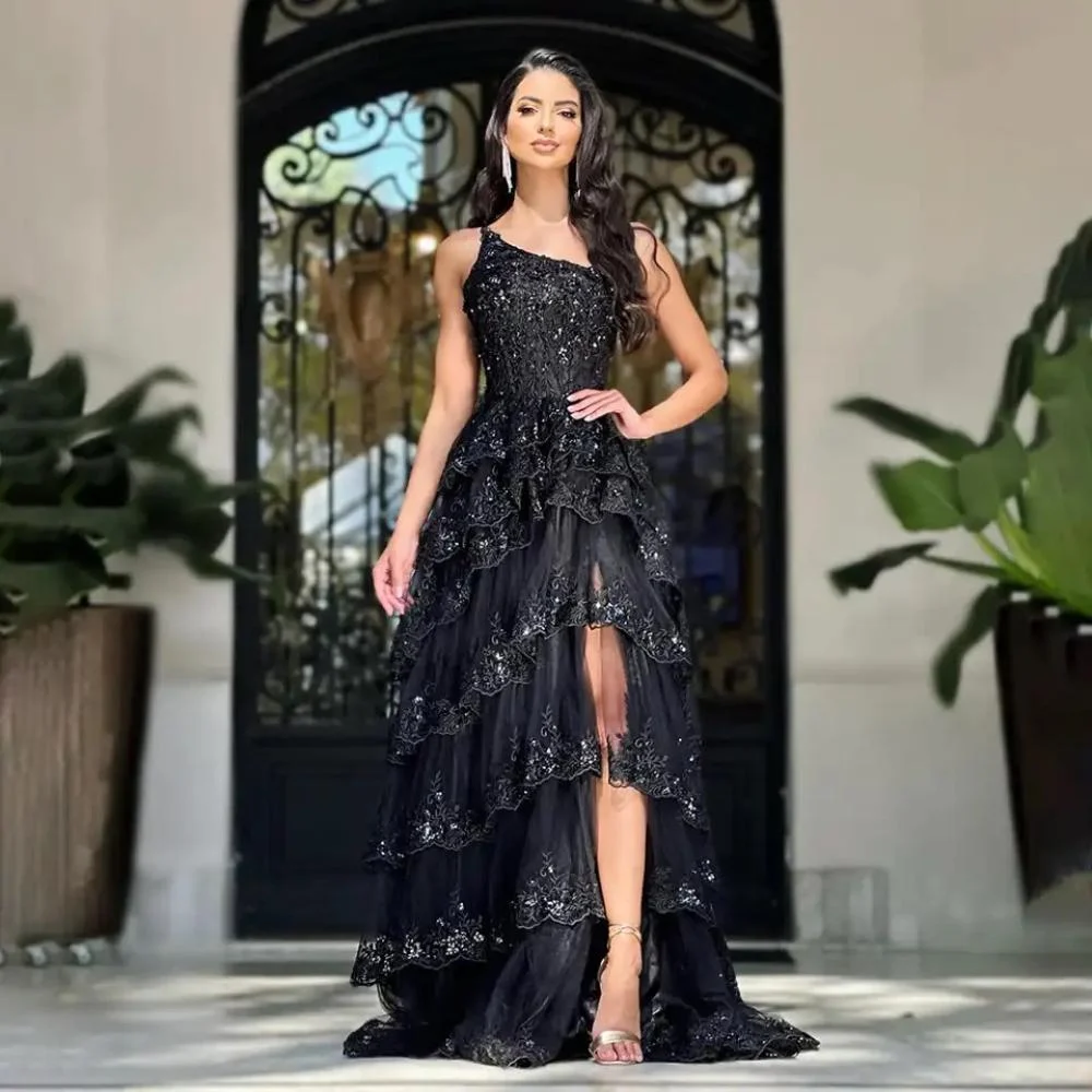 Layered dress with hand embroidery and a thigh-high slit